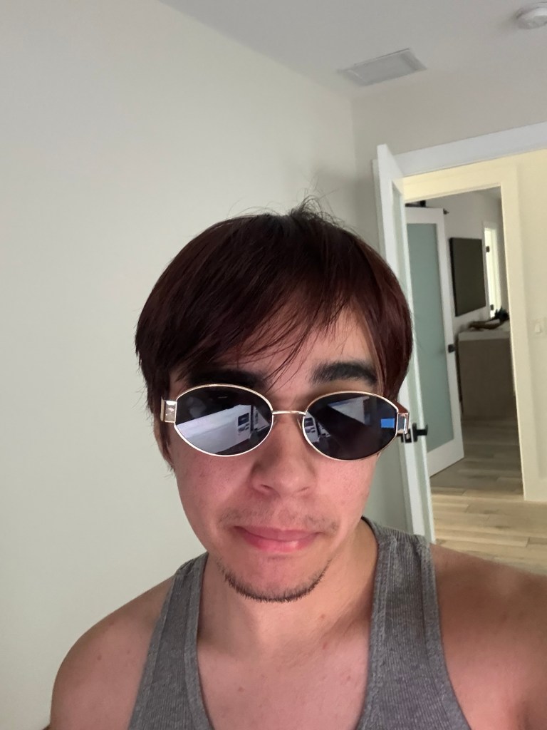 Super cool sexy guy with shades in photo